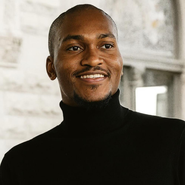 Jason A. Wilkinson in a black turtleneck